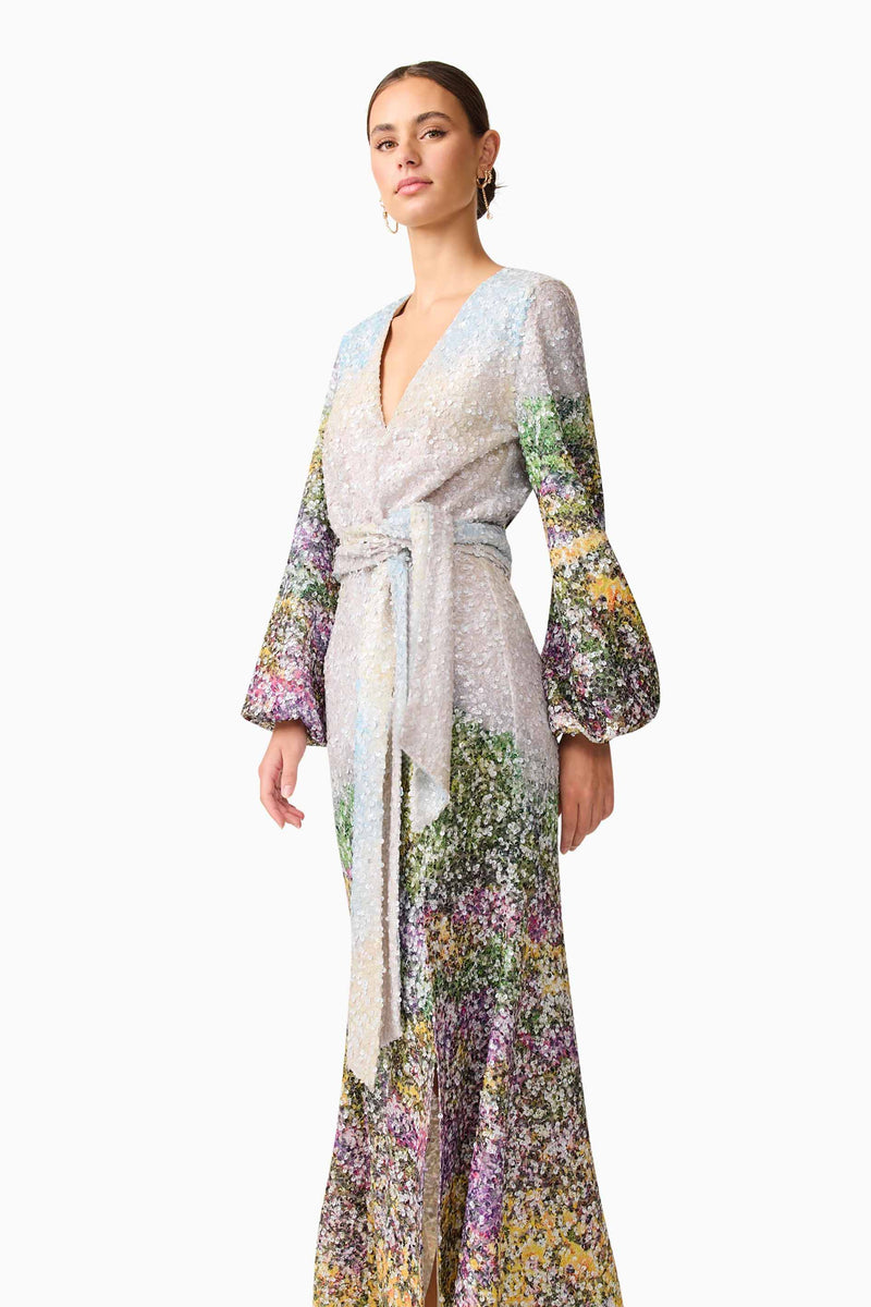 Brunette model wearing the Arden Long Sleeve Gown in Multi Ombre close up posed shot
