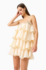 Poselia Tiered Mini Dress in Antique White with square neckline & 3D floral trim detailing close up looking away shot