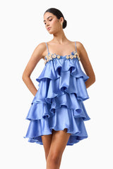 Poselia Tiered Mini Dress in Slate Blue with square neckline & 3D floral trim close up looking away shot