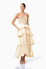 Poselia Tiered Maxi Dress in Antique White with strapless neckline & 3D Floral trim posed shot