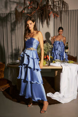 Model wear the Poselia Tiered Maxi Dress in Slate Blue to the races