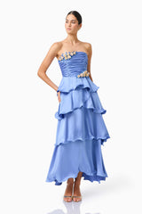 Poselia Tiered Maxi Dress in Slate Blue with strapless neckline & 3D floral trim posed shot