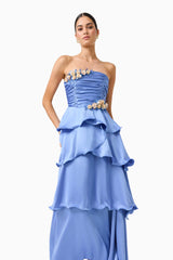 Poselia Tiered Maxi Dress in Slate Blue with strapless neckline & 3D floral trim close up posed shot