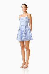Magnella Fit & Flare Mini Dress in Ice Blue with lace fabrication & strapless neckline side shot