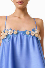 Poselia Tiered Gown Dress in Slate Blue with square neckline & 3D floral trim close up shot 