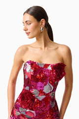 Solara Embellished Mini Dress in Red & Pink with sequin fabrication & strapless neckline close up looking away shot
