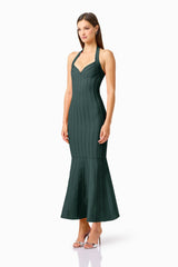 Virella Halter Gown in Dark Green with a v-neckline & mermaid skirt side shot