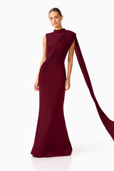 Tuloria Sash Gown in Burgundy Red with draped sash posed shot