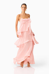 Brunette model wearing Swallowtail Day To Night Maxi Dress In Pink movement shot