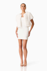 Brunette model wearing the Lucyna Short Sleeve Bolero in White Posed Shot