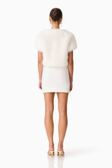 Brunette model wearing the Lucyna Short Sleeve Bolero in White Back Shot