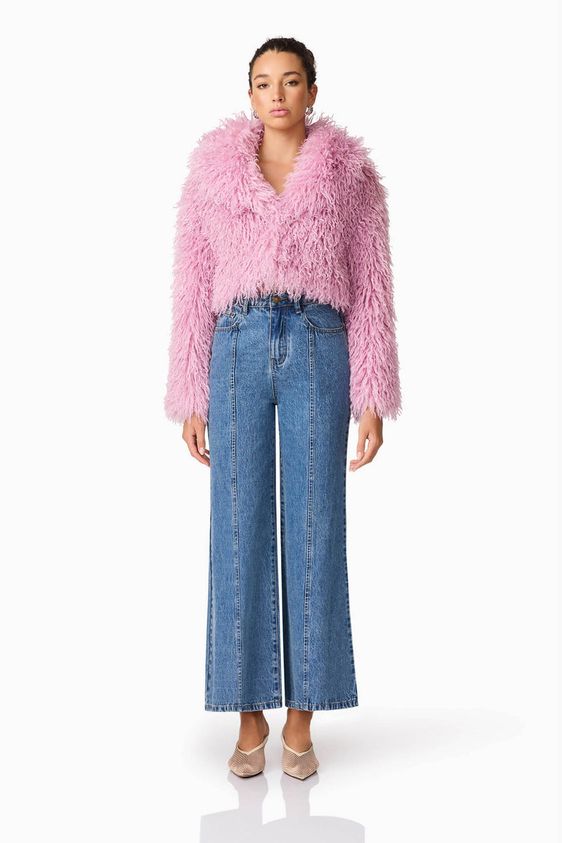 Brunette model wears Trisha Faux Fur Cropped Jacket in Pink Front Shot