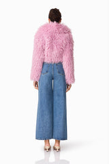 Brunette model wears Trisha Faux Fur Cropped Jacket in Pink Back Shot