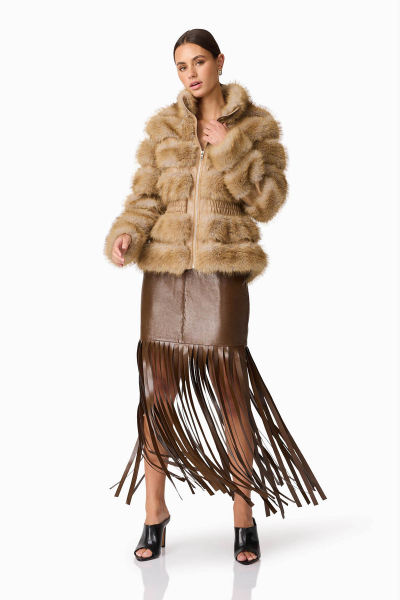 Brunette model wearing Aisling Faux Fur & Leather Jacket in Beige Posed Shot 2