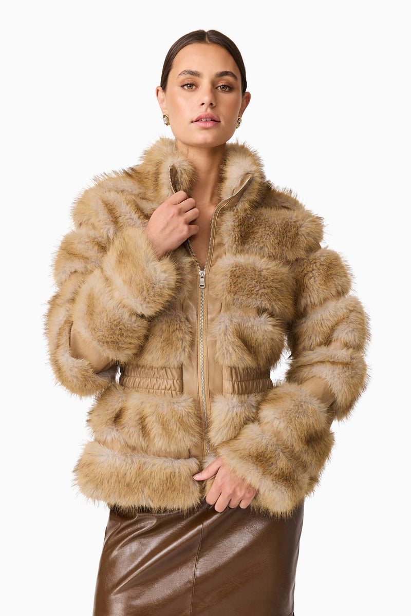 Brunette model wearing Aisling Faux Fur & Leather Jacket in Beige Close Up Shot