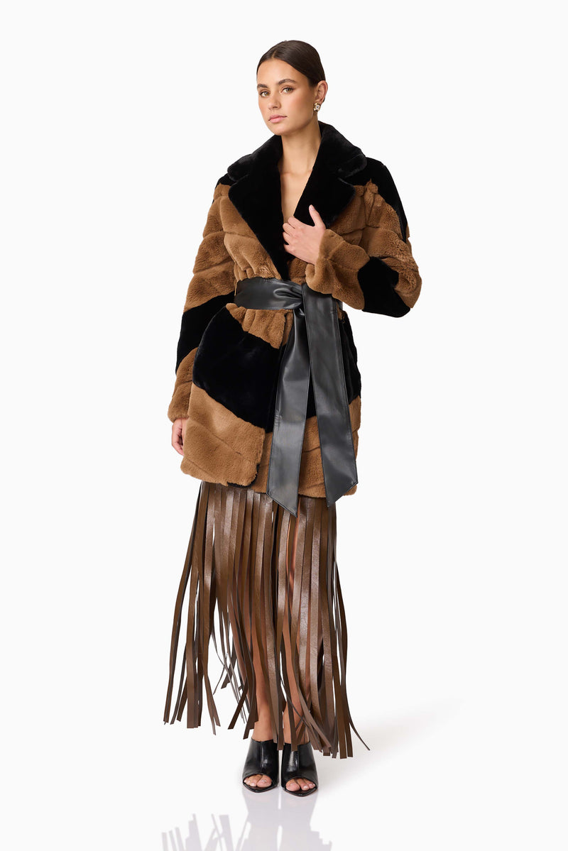 Brunette model wearing Felicia Faux Fur Coat in Black & Brown posed shot