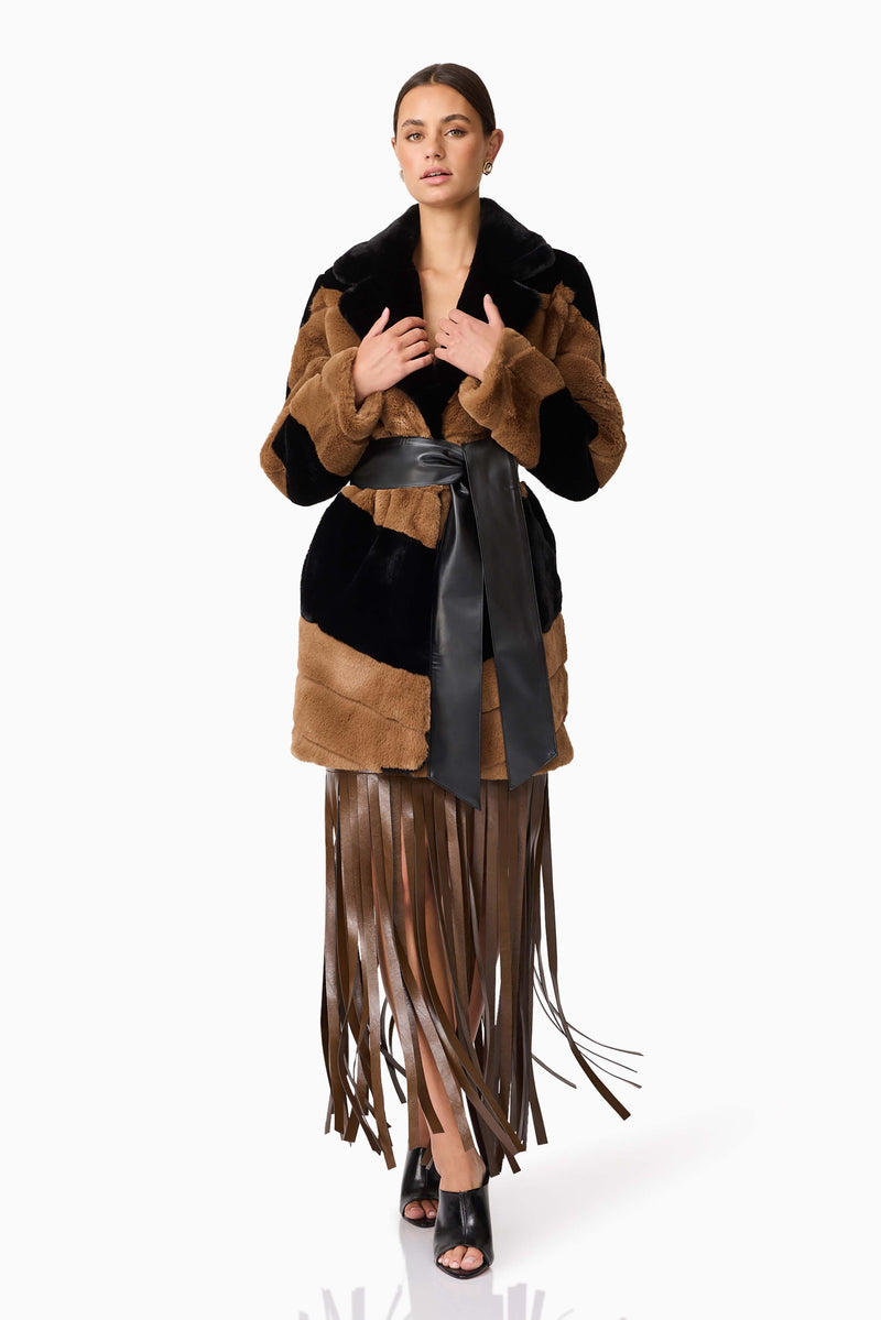 Brunette model wearing Felicia Faux Fur Coat in Black & Brown posed shot 2