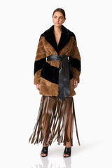 Brunette model wearing Felicia Faux Fur Coat in Black & Brown posed shot 3