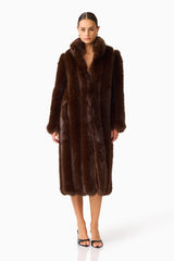 Camore Fur Coat in Brown with long sleeves posed shot