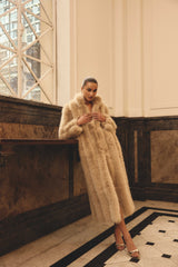 Brunette model Faux Fur Maxi Coat in Biege campaign shot