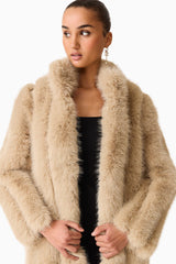 Brunette model Faux Fur Maxi Coat in Biege close up shot