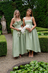 Brunette model wearing the Laurel Sleeveless Maxi Dress in Sage Green campaign shot 