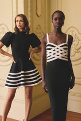 Models wearing the Ninette Coulum Midi Dress in Black & White & Ninette Puff Sleeve Mini Dress in Black & White to Cocktail event 