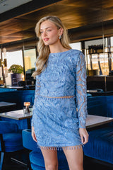 Model wears Elisa Top & Skirt Set in Steel Blue with beaded trim detailing to a girls lunch
