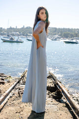 Brunette model wearing the Anaya Wide Leg Jumpsuit in Blue content shoot 