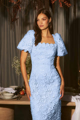 Model wearing the Mangnella Puff Sleeve Maxi Dress in Ice Blue to a baby shower
