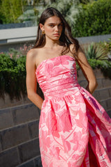Brunette model wearing the Dionne Strapless Gown in Pink Floral content shot