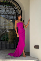 Model wears the Dahlira Asymmetrical Gown in Orchid Pink to destination wedding 