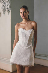 Model wears Clarisse Tulip Mini Dress in White to bridal shower event 
