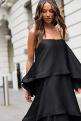 Model wearing the Tilly Tiered Maxi Dress in Black to a birthday lunch 