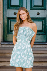 Model wears Lisette Ruffle Mini Dress in Sea Green to spring racing