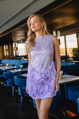 Blonde model wearing the Cerise Embellished Mini Dress in Purple campaign shoot