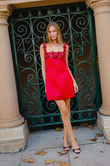 Brunette model wearing the Lucetta Shift Mini Dress in Red content shoot shot