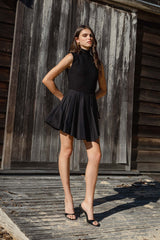 Brunette model wearing the Nydia A-Line Mini Dress in Black content shot