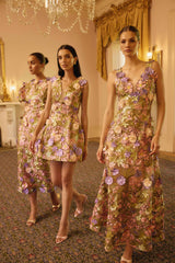 Model wearing the  Fiora A-Line Gown in Green & Pink Floral to wedding reception