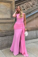 Blonde model wearing the Amelina Sash Gown in Pink campaign shot