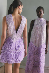 Brunette model wearing the Cerise Embellished Mini Dress in Purple campaign shot