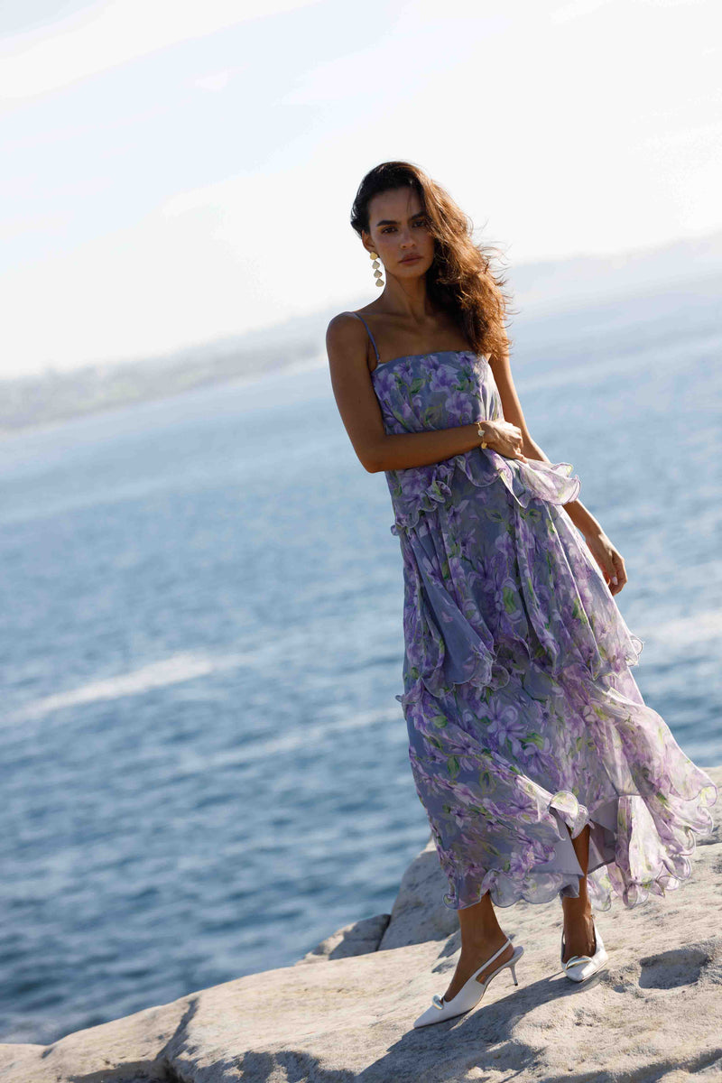 Brunette model wearing Milena Strapless Maxi Dress in Purple Floral front shot