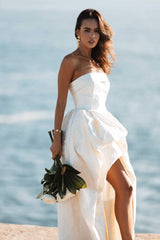 Brunette model wearing Galadirel Strapless Gown in White posed close up campaign shot