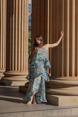 Brunette model wearing the Armani Tiered Maxi Dress In Blue Floral campaign shot