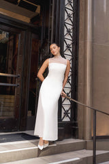 Brunette model wearing Margot Satin Gown in White campaign shot