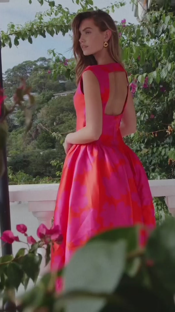 Brunette model wearing Eloise A-Line Midi Dress in Pink & Red campaign video