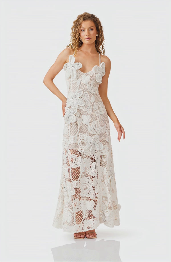 Blonde model wearing Kyra Crochet Gown in White video shot